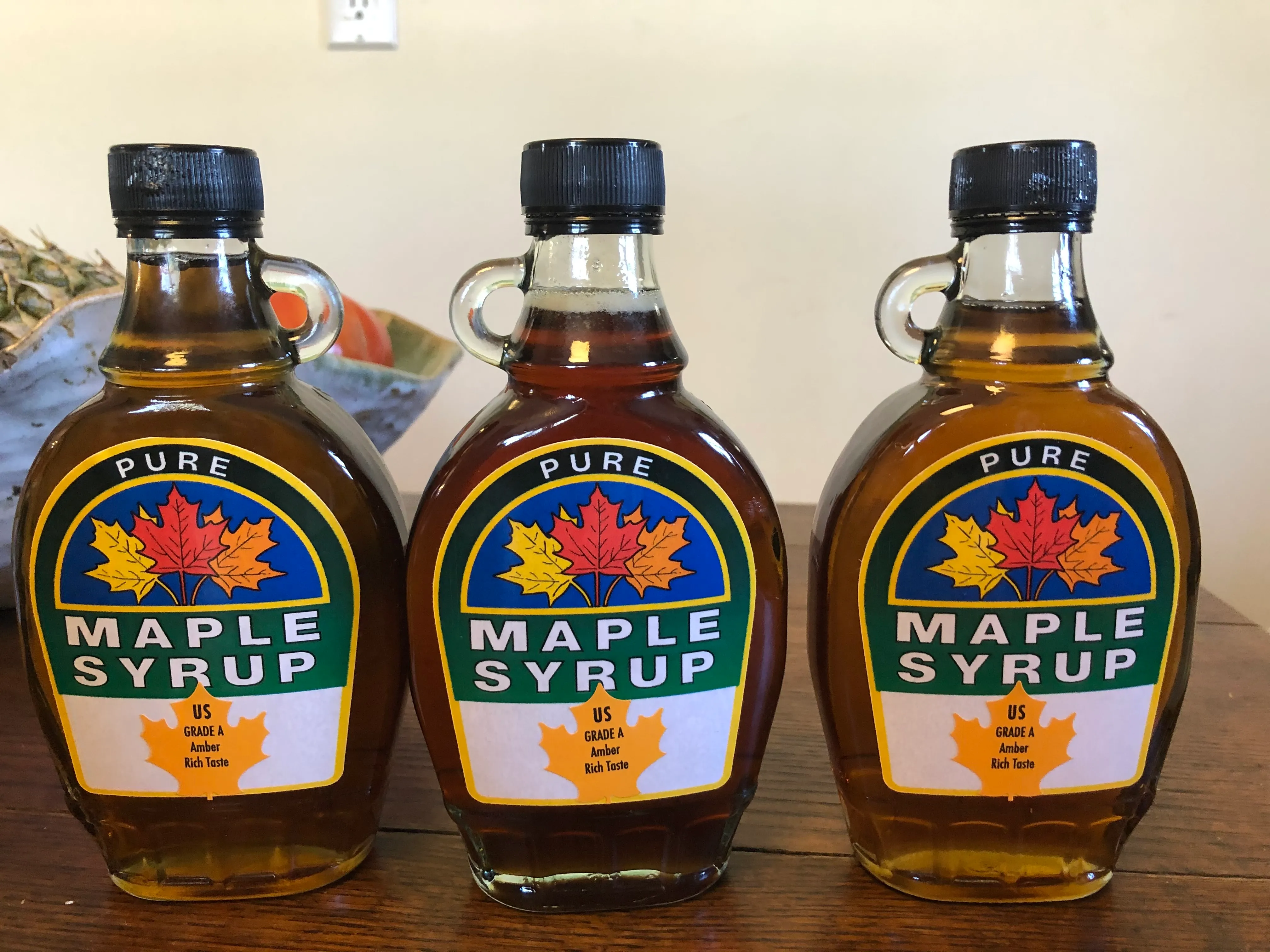 Three bottles of Grade A Pure Maple Syrup from Gray Family Farm
